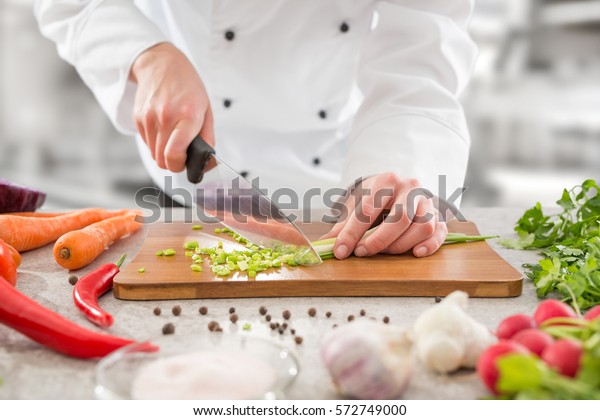 chef cooking food kitchen restaurant cutting cook\
hands hotel man male knife preparation fresh preparing concept -\
stock image