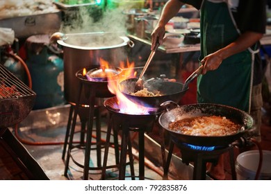 Chef Cooking Food At Street Food , Yaowarat Road, Bangkok,Thailand