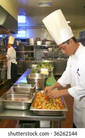 chef cooking at kitchen