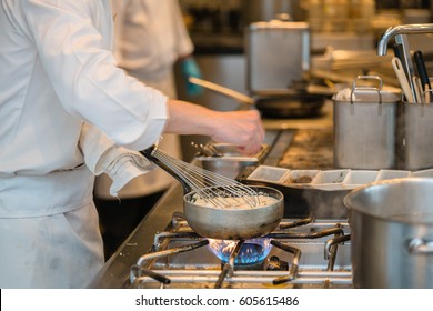 chef cooking in the kitchenp