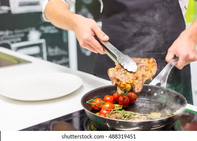 Chef Cooking Meat