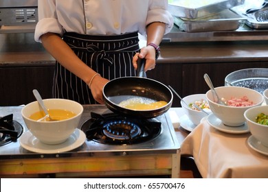 Chef cooking omelet