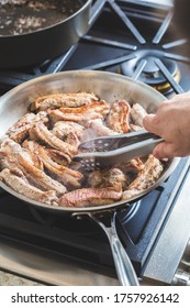 Chef Cooking Pork Baby Back Ribs Meat On A Steel Pan