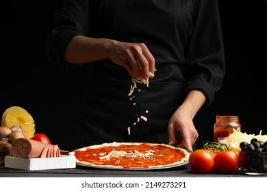 Chef cooks pizza, sprinkled with mozzarella cheese, freezing in motion on the background with ingredients. Recipe book, menu, home cooking - Powered by Shutterstock