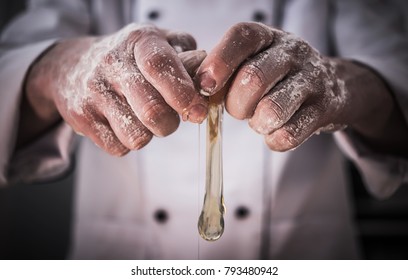 Chef Cracking Eggs in His Restaurant Kitchen. Making Crust. Closeup Photo.  - Powered by Shutterstock