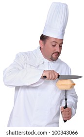 Chef Cutting Open A Burger Box