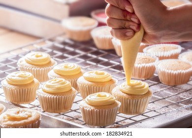 Chef Is Decorating Cupcakes For A Party