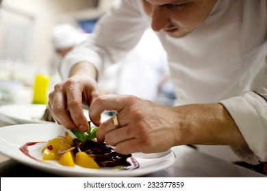 Chef Is Decorating Delicious Dish, Motion Blur On Hands