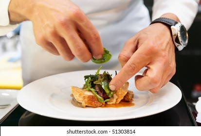 Chef Is Decorating Delicious Dish, Motion Blur On Hands