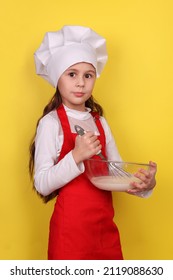 Chef Girl Kneading Dough Isolated On Yellow Background