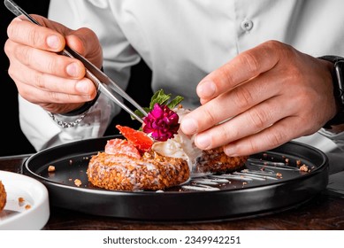 chef hand decorated cheese pancakes with ice cream and sweet sauce - Powered by Shutterstock