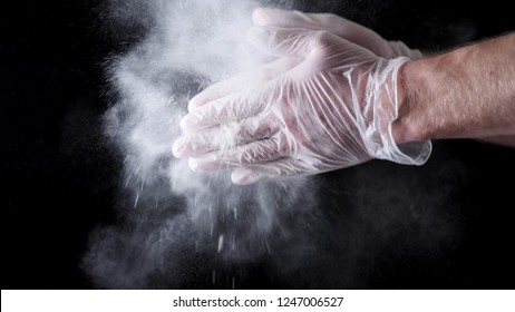 Chef Hands Clapping With Flour In Slow Motion On Black Background. Frame. Chef Claps Hands Together With Flour, Super Slow Motion