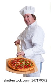 A Chef Holding A Pizza On A Peel On A White Background.