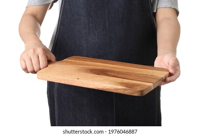 Chef holding wooden cuttingboard isolated on white background