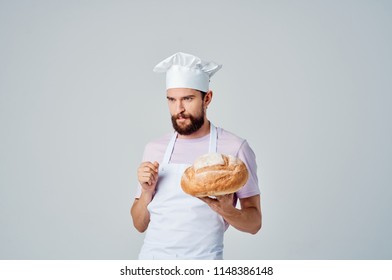  chef with a loaf of bread                              