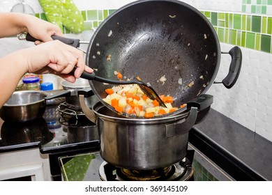 Chef Making Chicken And Vegetable Soup In The Kitchen Soup