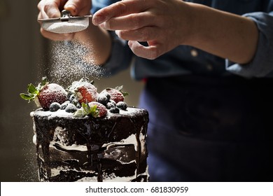 Chef is making chocolate cake