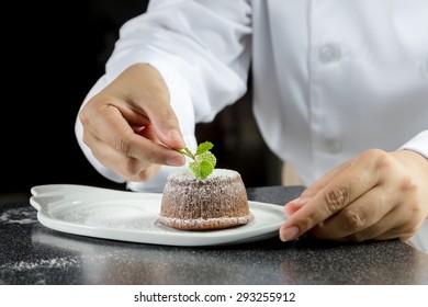 Chef Making Lava Chocolate Cake In The Kitchen