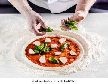 Chef Making Pizza