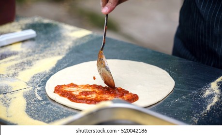 Chef Making Pizza