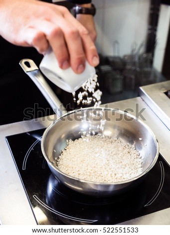 chef making risotto