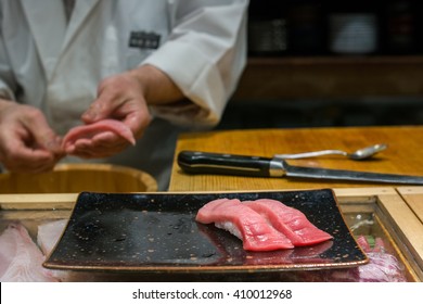 Chef making sushi , Asian chef with sushi. Focus on sushi