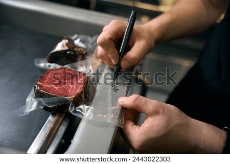 Similar – Image, Stock Photo Crop cook preparing meat and hotdog on grill machine