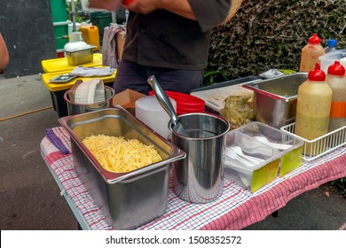 Chef Managing Dish In A Mexican Fast-food Truck