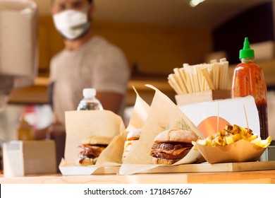 Chef With Mask For Coronavirus Prevention On Food Truck , Selective Focus