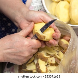 Chef Peeling Potatoes