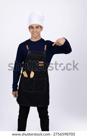 Chef pointing at himself with thumbs