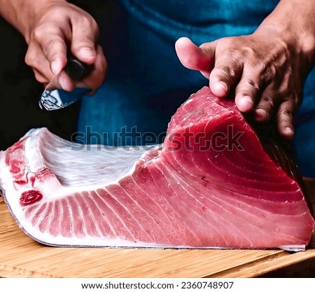 The chef is preparing fish meat