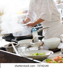 Chef preparing food - Powered by Shutterstock