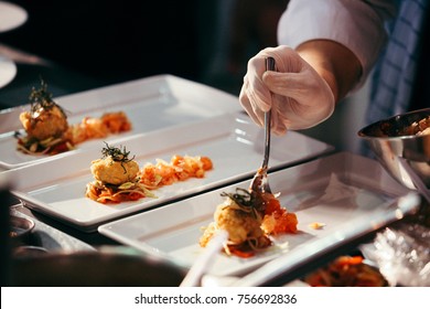 Chef preparing food, meal, in the kitchen, chef cooking in kitchen, Chef decorating dish, closeup - Shutterstock ID 756692836