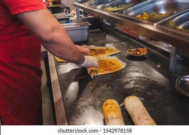 Chef Preparing And Making Traditional Turkish Doner Kebab Meat. Shawarma Or Gyros. Turkish, Greek Or Middle Eastern Arab Style Chicken Doner Kebab Food On Isolated White.