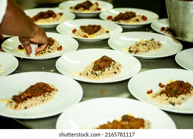 Chef Preps Quinoa And Pork