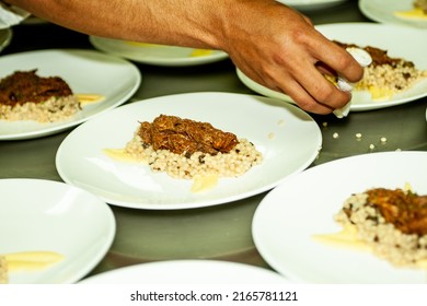 Chef Preps Quinoa And Pulled Pork