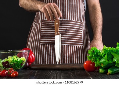 Chef. Professional Chef Knife Including Assorted Fresh Vegetables