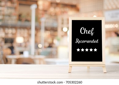 Chef Recommend And Five Star On Blackboard Standing Over Blur Restaurant Background, Copy Space For Text, Food And Drinks Background, Banner