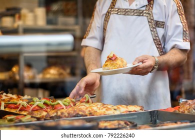 Chef Serving Food At A Traditional Turkish Restaurant