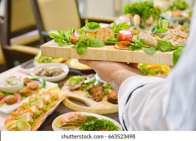 Chef Serving Lebanese  Food 