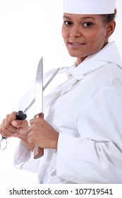 Chef Sharpening A Knife
