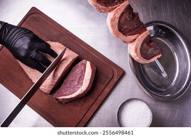 Chef Slicing Raw Meat for Gourmet Culinary Presentation - Powered by Shutterstock