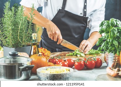 The chef slicing vegetables. - Powered by Shutterstock