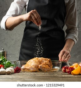 chef sprinkles frozen salt, chicken with fruit close up, background for recipe book, menu, instagram - Shutterstock ID 1215329491