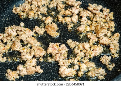 Chef Stir Fry Minced Meat In A Frying Pan. Frying Minced Meat In A Pan, Close-up. Cooking Taco Meat At Home Cooking. Frying Mince In Frying Pan On Stove