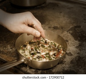 Chef Is Stirring Risotto, Toned, Vignetting Added