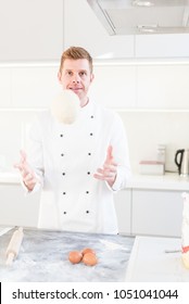 Chef Tossing Pizza Dough