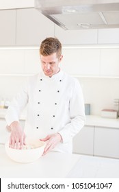 Chef Tossing Pizza Dough