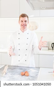 Chef Tossing Pizza Dough